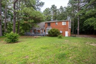 Spacious 4BR Getaway w Games Pier Firepit - 8