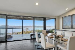 Spacious Sandy Bay Retreat with Water Views - 0