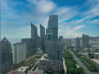 Junyi Hotel Apartment (Qingdao May Fourth Square Vientiane City) - 4
