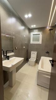 Spacious 3-Bedroom Furnished Apartment with Private Entrance in 6th of October - 5