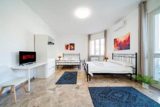 Milano Malpensa 5' - FreePark, Wifi, AC - 3 Suite - 3