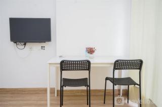 Fancy and Nice Studio Room at Casa De Parco Apartment By Travelio - 1