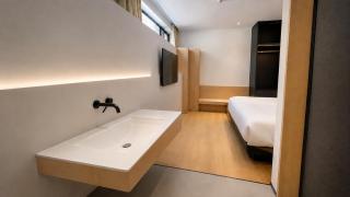 Zhangjiajie Aurinea Inn - Wulingyuan Sign Gate,5-minute walk to the East Gate of the scenic area,Free self-service washer, dryer, and drying terrace - 9