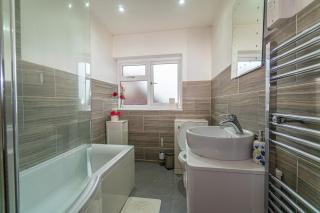 Spacious 3BR Home with Playroom & Free Parking - 4
