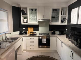 Deluxe One-Bedroom Apartment with Patio - 1