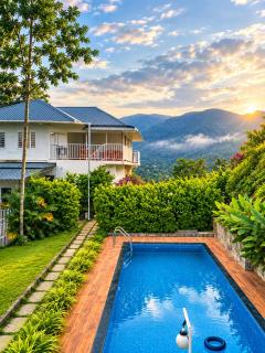 Munnar Ice Pellets Resort with Pool by VOYE HOMES - 0