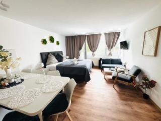 Ferienwohnung Harmonia inklusive Hallenbad, Außenpool, Sauna & Fitnessstudio, familienfreundlich ausgestattet, großes 2-Zimmer-Apartment - 0