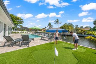 Canalfront Retreat Pool Dock & Putting Green - 3