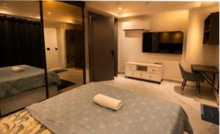 CozyDen-1BHK Near Medanta-Sec39 Gurgaon-Projector-Balcony - 5