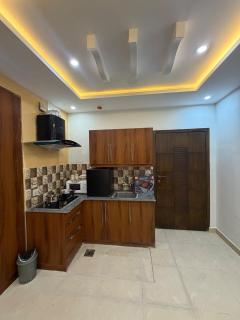 Comforts stay 1BHK Cozy Apartment lama H-13 islamabad - 4