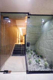 Apartment with an elegant lounge, smart entry, and a 75-inch 4K QLED TV - 1
