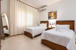 Serene 3BR With Private Garden in Tla Al Ali - 8