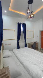 Standard 2 Bedroom Private Compound Where You Manage Your Electricity Yourself, AC, WiFi & Snooker Fun - 1