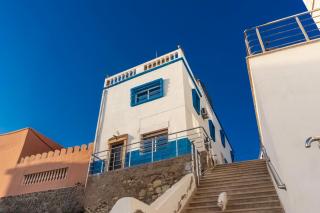 blue horizon tamraght-elegant, evokes ocean view - 0