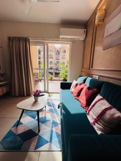 Elegant 1 BHK Pool View Stay with Gym & Parking - 2