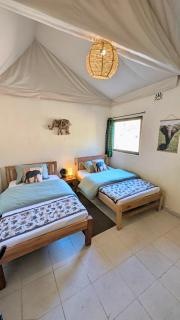 2 Authentic Mara Bush Cottages- Meals Included - 3