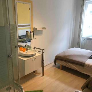 Room with a shower andsink - 3