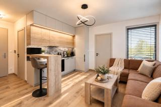 ALURE RESIDENCES 9 & 24h self check-in, private parking in front of the apartment building included, new building, terrace, the apartment building has its own park with a lake and outdoor fitness, children's playground, CITY CENTER - 2