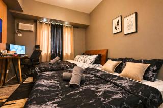 28F Avida Riala Tower 1 Modern Studio with PS4, 100Mbps WiFi, Pool Access and Workspace - 1