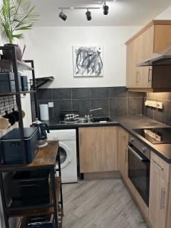 1BR Flat near M6Jct23 and A580 with multi car parking - 2