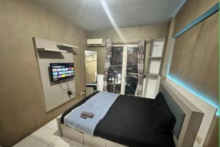 Mutiara Apartement by Roomate Inn, Bekasi - 9