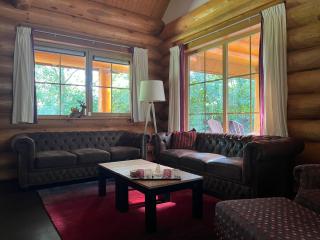 Canadees log home Maple Leaf Lodge met sauna - 5