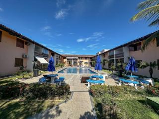 Flat com 1 quarto com ar split, sala e cozinha completa, No condomínio Portal do Atlântico a 100m praia de Taperapuã (Barraca do Gaúcho) , portaria 24hrs, piscina. - 3