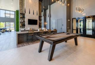Modern 2BR Retreat with Pool, Gym and Balcony - 7