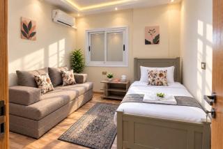Spacious 4BR Home with Private Patio in Banafseg - 7