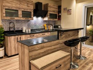 Spacious 4BR Home with Private Patio in Banafseg - 4