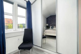 Charming Apartment with Parking and Balcony Near the City Centre by Noclegi Renters - 1