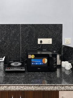 Private Apartment with Shared Kitchen - 2 Mins Walk to Metro, Sindhi Camp Bus Stand - 1