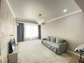 A bright two-room apartment in the Ak-Maral 2 residential complex - 1