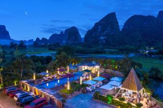 Xindu Homestay Yangshuo · Ten-Mile Gallery · Yulong River · 2 Mins Walk to Shuiedi Bamboo Raft Pier · Large Outdoor Swimming Pool · Rooms with Karst Mountain View · Discounted Attraction Tickets & E-bike Rental - 4