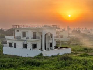 ELIVAAS Signature Mannat Villa 4-BHK English-Style Forest-View Villa with Covered Deck, Swing, Table Tennis & Lawn - 0