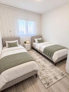 Modern Apartment in City Center, 2BR - Free Private Parking Garage - 2
