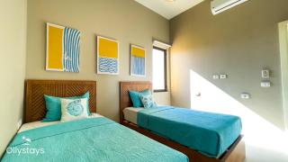 Ollystays Scenic Tawila 2BR, Lagoon & Shared Pool View! - 7