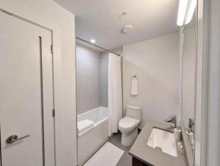 Stylish 1BR Suite with AC and Steps to The Drive - 1