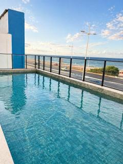Apartamento confortável com vista para o mar e piscina - 7