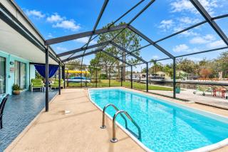 Cozy Oasis Screened Pool Picturesque Water Canal Views! - 0