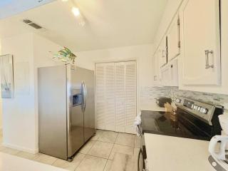 Second-floor condo with beach access shared outdoor pool & tennis court - 3