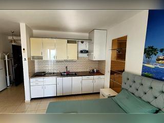 White and Blue Modern SeaView Studio - 4