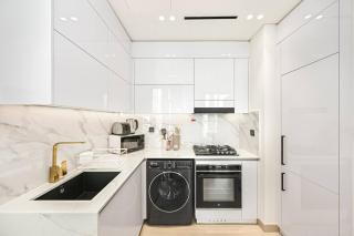 Chic 1BR Apartment | Balcony & Views | JVC Dubai - 7
