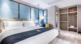 Echarm Hotel Huzhou Wuyue Plaza Children's Clothing City - 4