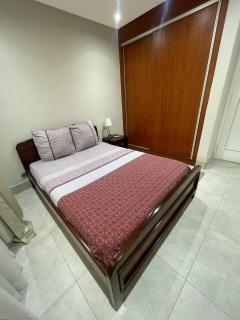 Elegant 2BR Retreat at Alema Court - Near Airport - 1