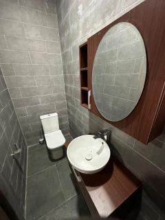 1 bed Guest restroom at Saco Apartments - 6