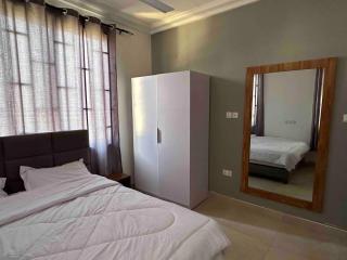 1 bed and Guest Restroom at Saco Apartments - 4