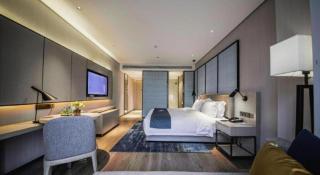 Echarm Hotel Yingshang High-speed Railway Station Wuzhou Wanhui Plaza - 1