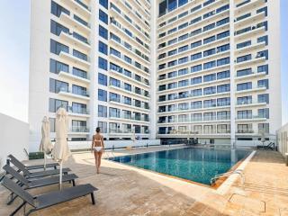 Vogue Vacation Homes, Alexis Tower Jabal Ali Walkable to Metro Station, near Expo City Dubai, One Bedroom Apartment with Balcony, Pool and Vibrant Community View, Access to all Amenities - 0