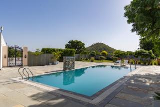 ELIVAAS Signature The Shyam Estate 8-BHK Villa with Private Pool, Kids' Pool, Landscaped Lawns & Aravalli Hill-View Balconies - 1